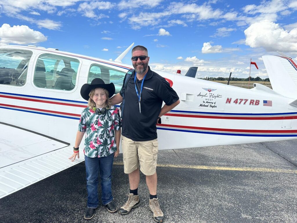 Stetson and Command Pilot John Kiser after an angel flight to Stetson 's care for NF1.